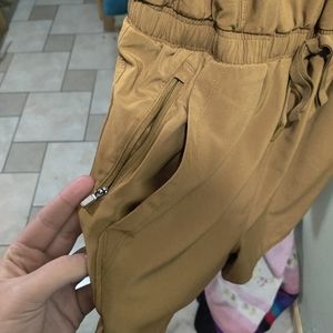 I am selling a caramel colored sports romper.
